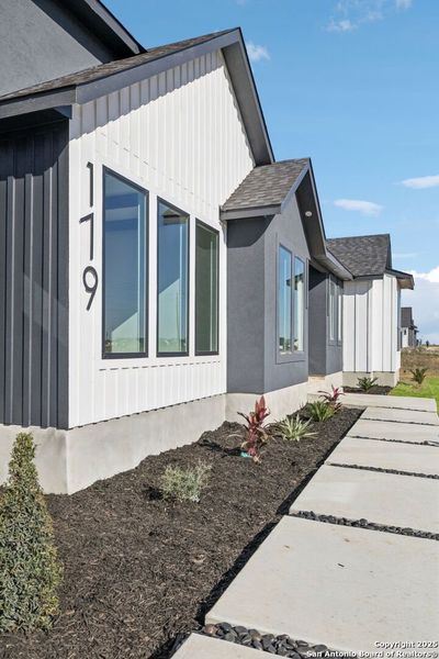 Exterior details and patio area of a home in , Floresville (Image 3).