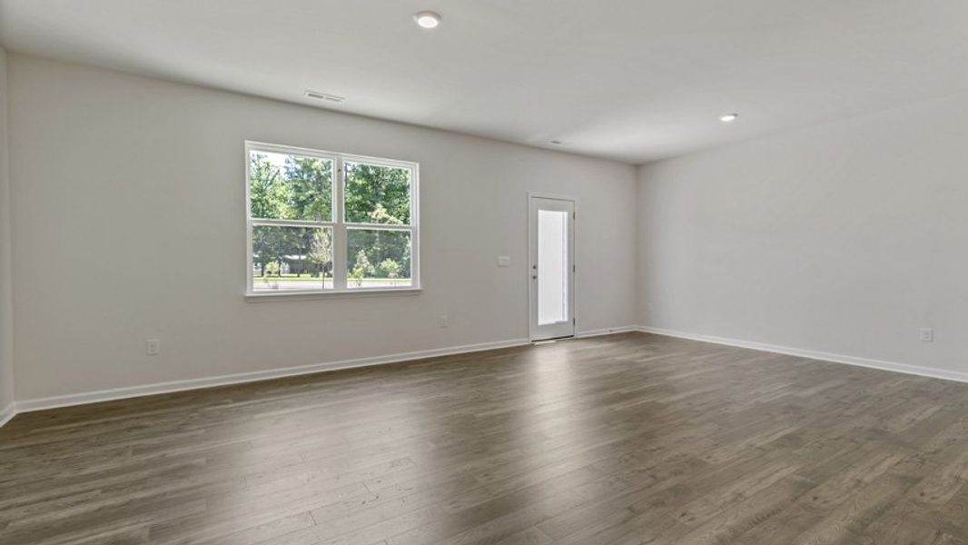 Representative unfurnished interior of a home built from the DANIEL by D.R. Horton in The Townes Park, Apex (Image 11). Representative unfurnished interior of a home built from the DANIEL by D.R. Horton in The Townes Park, Apex (Image 11).