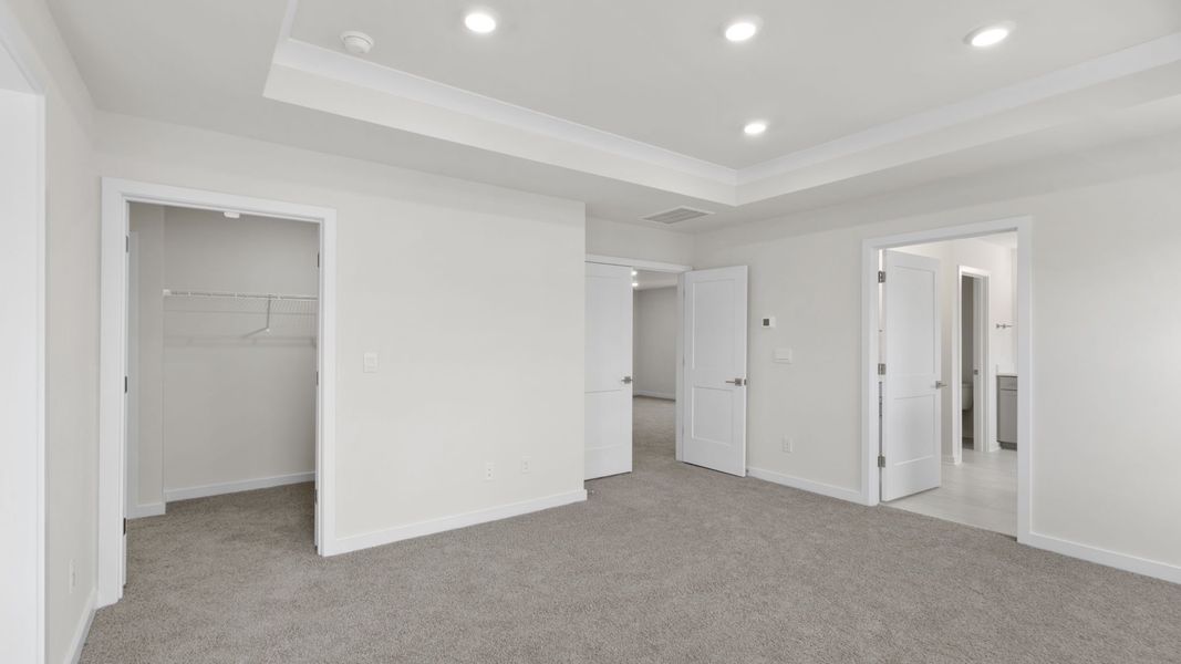 Spacious, unfurnished interior of a new home in Hemlock, Williamston (Image 34).