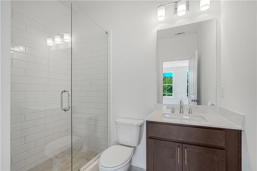 Furnished interior view inside a new home in Waterhaven, Cumming (Image 7).
