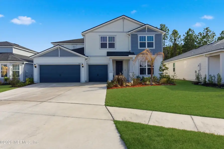 Front exterior of a new home in , Middleburg, FL, highlighting curb appeal (Image 1). Front exterior of a new home in , Middleburg, FL, highlighting curb appeal (Image 1).