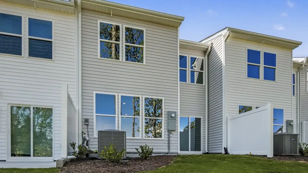 Exterior details and patio area of a home in Chapel Townes, Raleigh (Image 4). Exterior details and patio area of a home in Chapel Townes, Raleigh (Image 4).