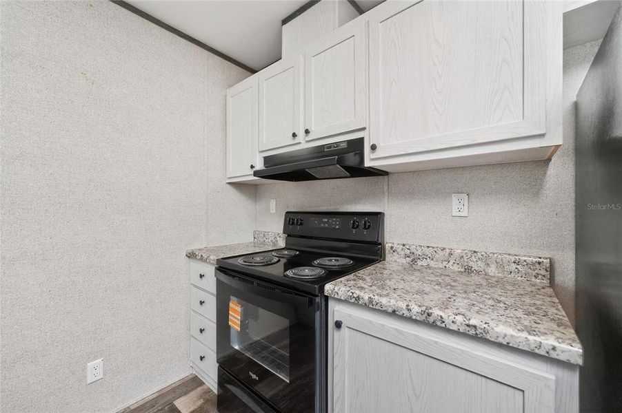 Furnished interior view inside a new home in , Port Charlotte (Image 4).
