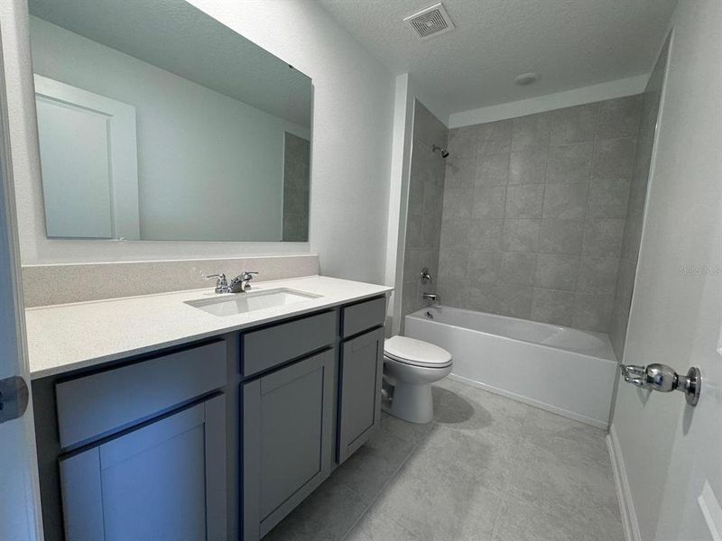 Furnished interior view inside a new home in Cascades, Davenport (Image 10).