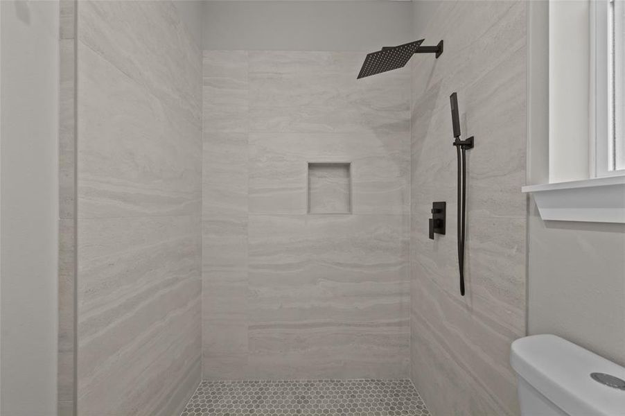 Large shower with rain head and wand