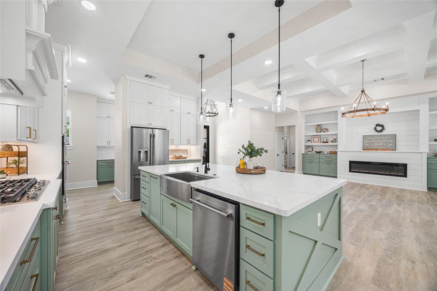 Perfect for Entertaining this Oversized Island is the hub of the home, offering tons of storage with cabinets all around.