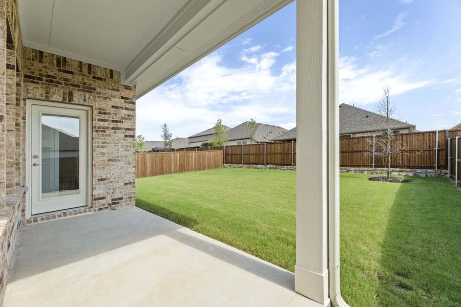 Exterior details and patio area of a home in Meadow Run, Melissa (Image 3).