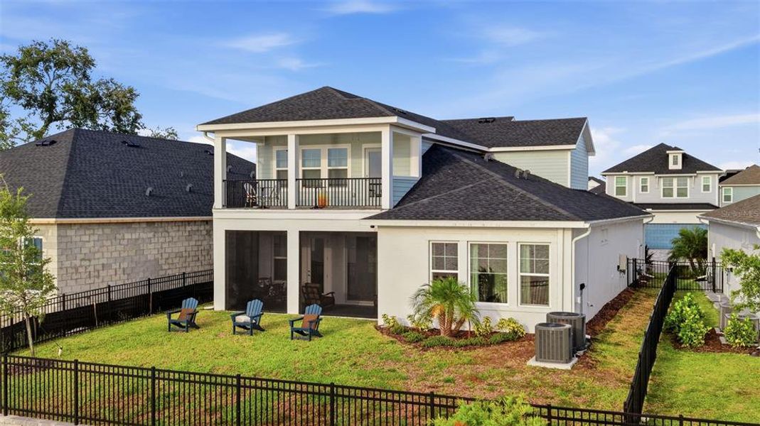 Front exterior of a new home in Emerald Landing at Waterside at Lakewood Ranch – Lake Series, Sarasota, FL, highlighting curb appeal (Image 23). Front exterior of a new home in Emerald Landing at Waterside at Lakewood Ranch – Lake Series, Sarasota, FL, highlighting curb appeal (Image 23).