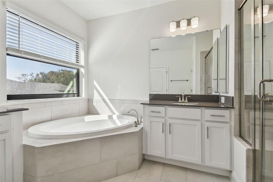 Photos are not the home listed, but same floor plan.