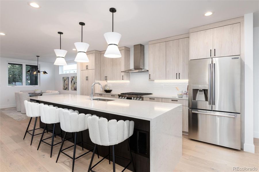 Staging Photos are from 2090 Eliot Street.  Mirror image floorplan with similar finishes.