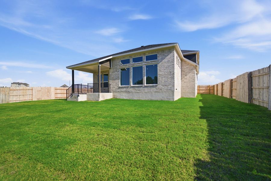 Exterior details and patio area of a home in Lariat, Liberty Hill (Image 23). Exterior details and patio area of a home in Lariat, Liberty Hill (Image 23).