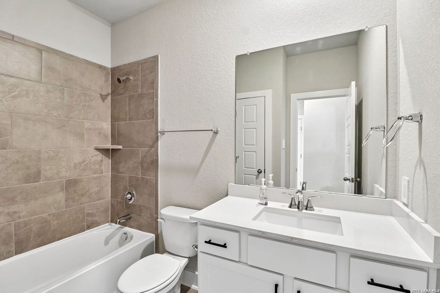 Furnished interior view inside a new home in Estancia Ranch - Premier Series, San Antonio (Image 8).