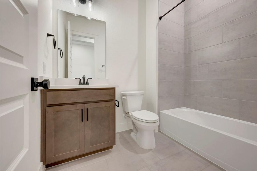 Furnished interior view inside a new home in Elyson 45', Katy (Image 9).