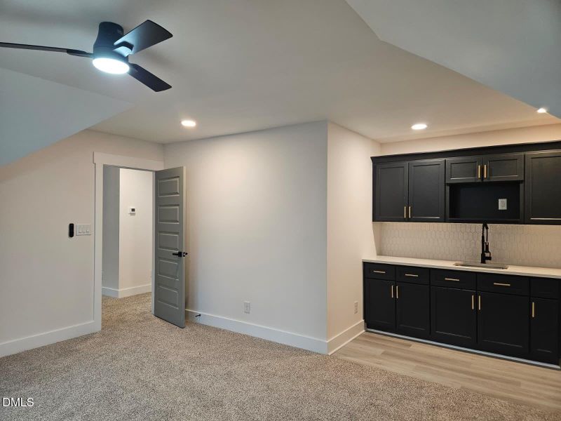 second floor enterteiment room with kitc