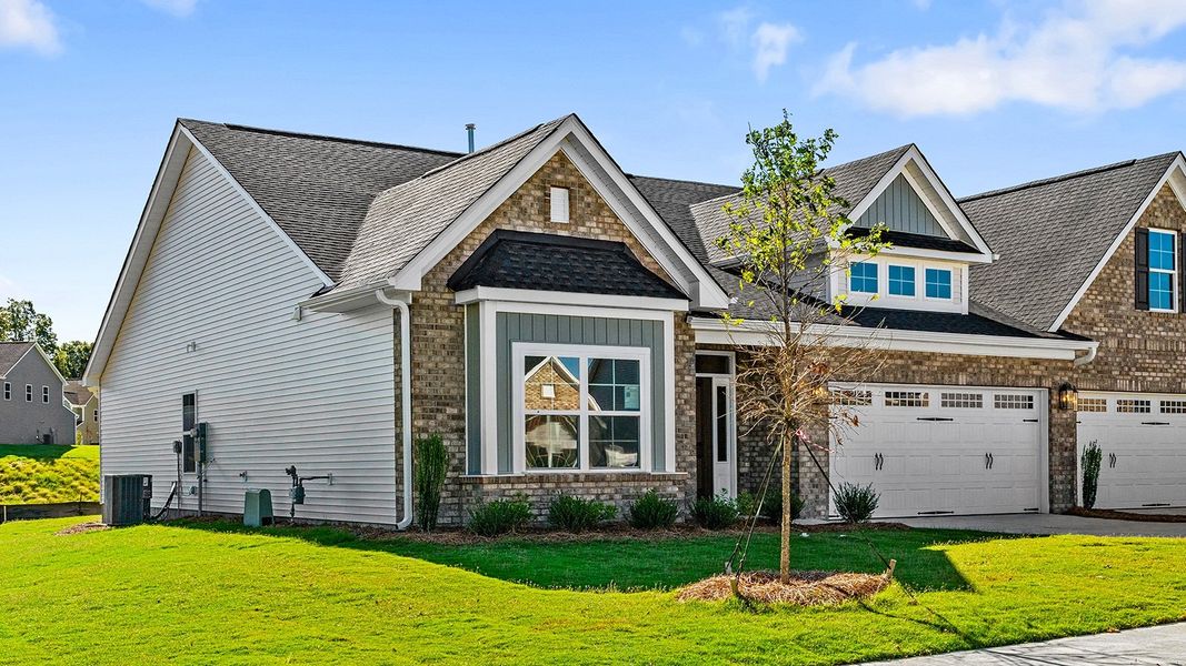 Front exterior of a new home in Fieldstone, Lexington, NC, highlighting curb appeal (Image 17).