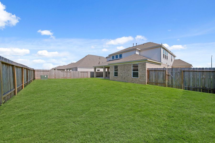 Front exterior of a new home in Beacon Hill, Waller, TX, highlighting curb appeal (Image 1). Front exterior of a new home in Beacon Hill, Waller, TX, highlighting curb appeal (Image 1).