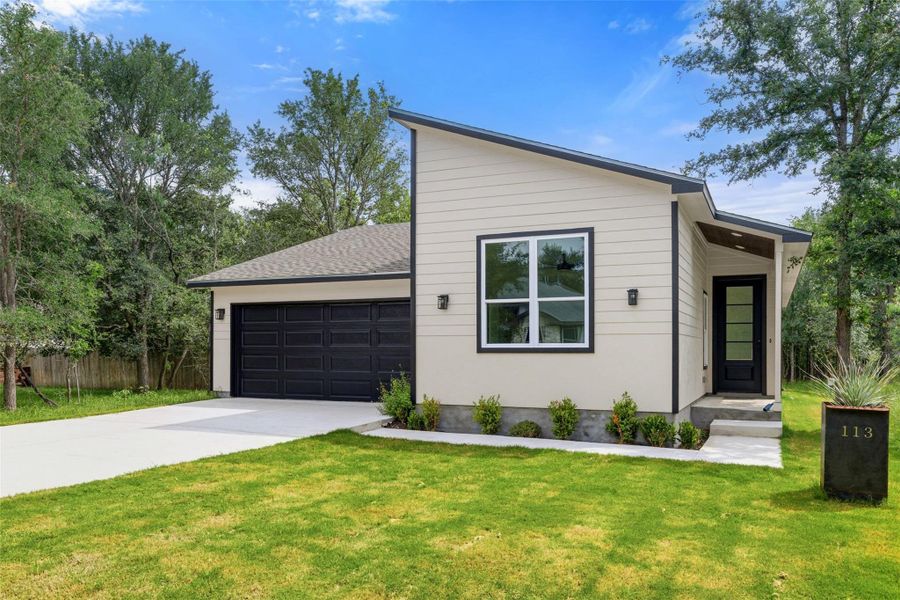 Front exterior of a new home in , Bastrop, TX, highlighting curb appeal (Image 2). Front exterior of a new home in , Bastrop, TX, highlighting curb appeal (Image 2).