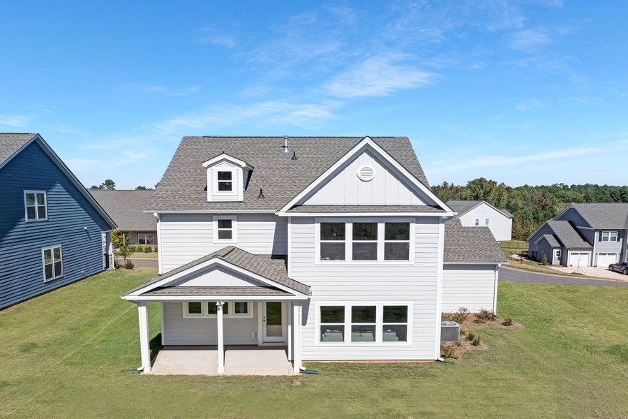 Front exterior of a new home in Edgewater - The Links, Lancaster, SC, highlighting curb appeal (Image 2). Front exterior of a new home in Edgewater - The Links, Lancaster, SC, highlighting curb appeal (Image 2).