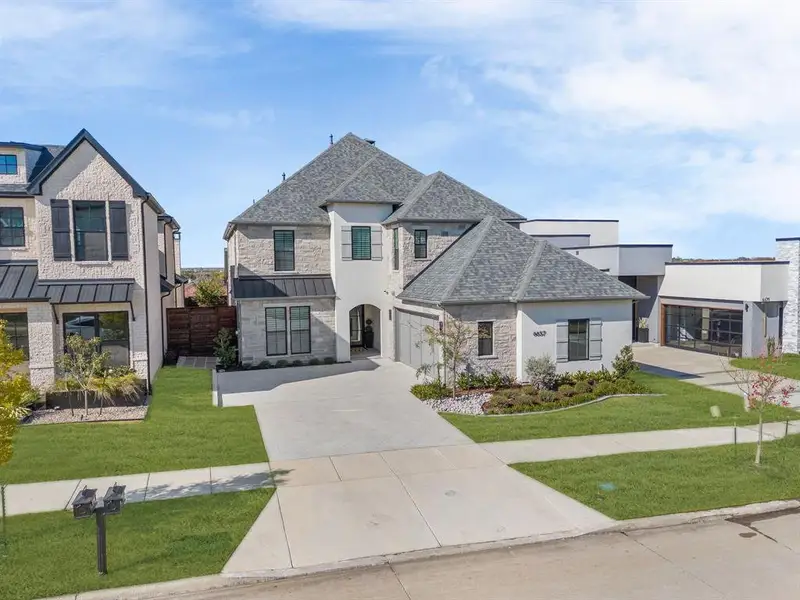Front exterior of a new home in , Frisco, TX, highlighting curb appeal (Image 2). Front exterior of a new home in , Frisco, TX, highlighting curb appeal (Image 2).