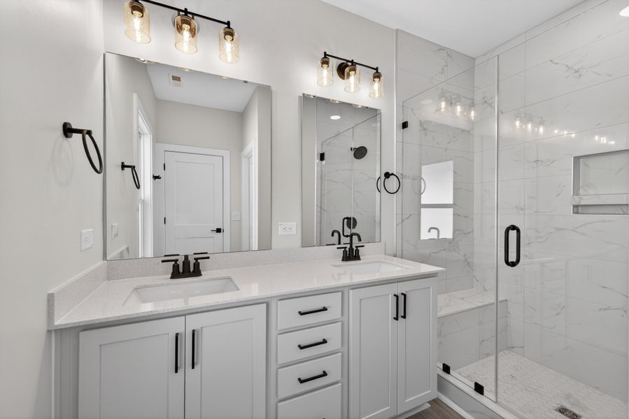 Representative furnished interior of a home built from the Atlas Interior Unit by Baker Residential in Atwater Station - Midtown Collection, Fuquay Varina (Image 13).