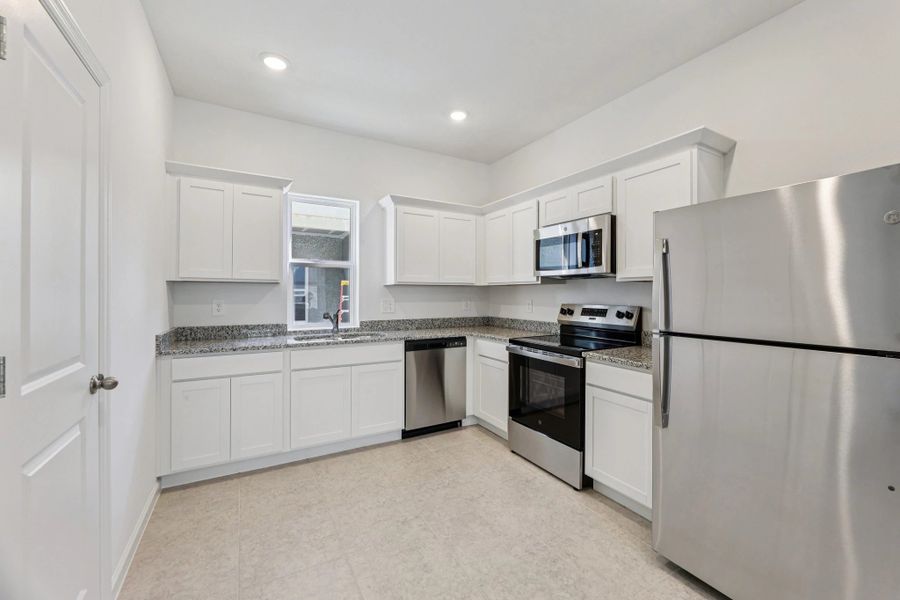 Representative furnished interior of a home built from the Ellis by Starlight Homes in Hawks Run, Kissimmee (Image 11).