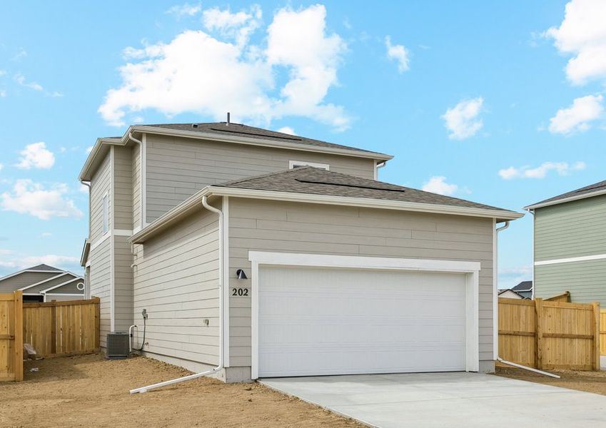 The Carnation is a beautiful two story home with siding.