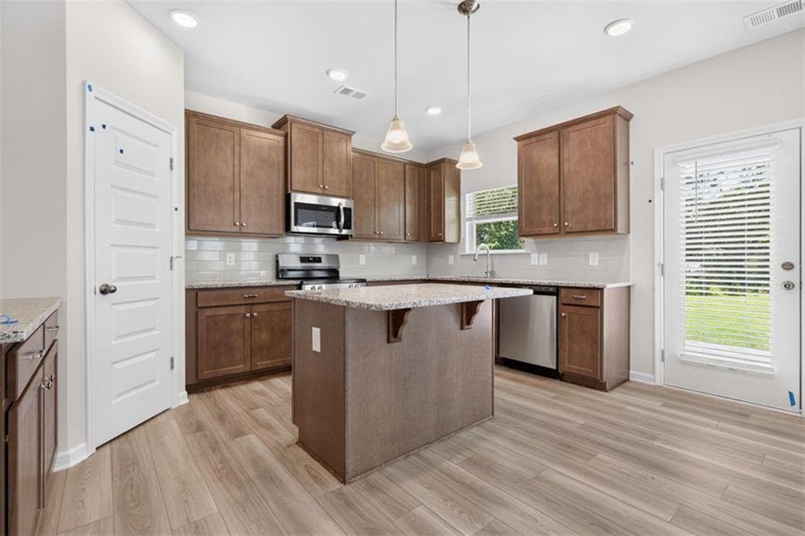 Furnished interior view inside a new home in Summerfield Place, Carrollton (Image 7).