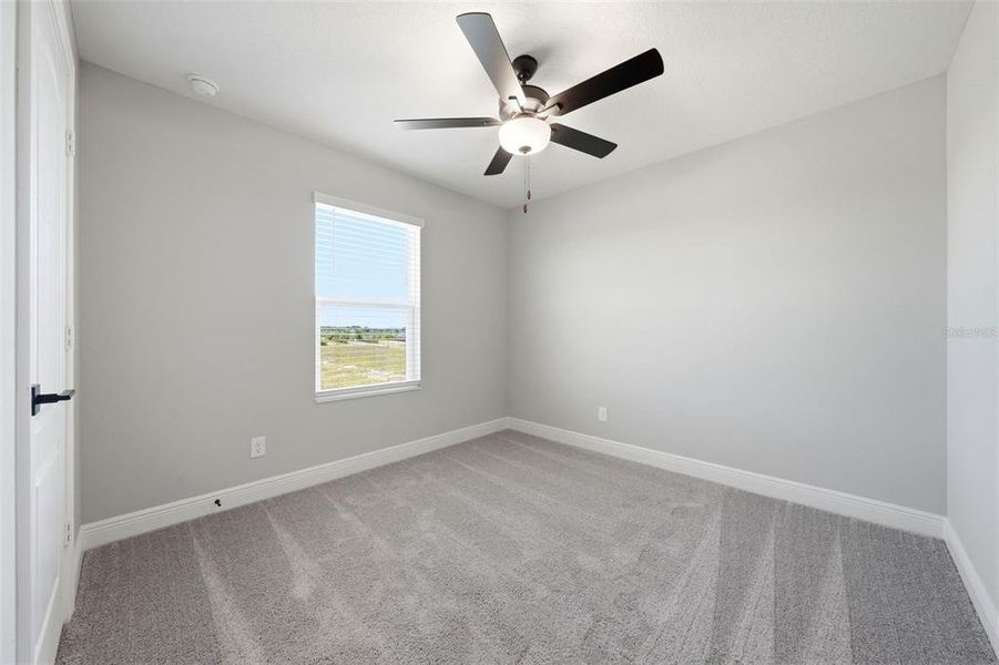 Spacious, unfurnished interior of a new home in Gum Lake Preserve, Lake Alfred (Image 23).
