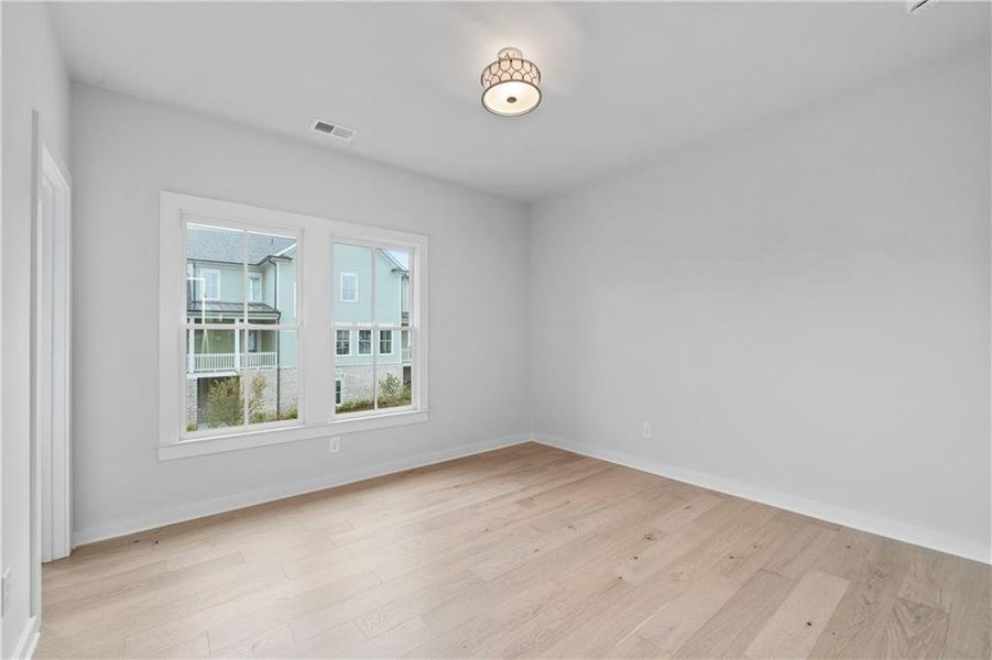 Spacious, unfurnished interior of a new home in Crossroads, Milton (Image 32).