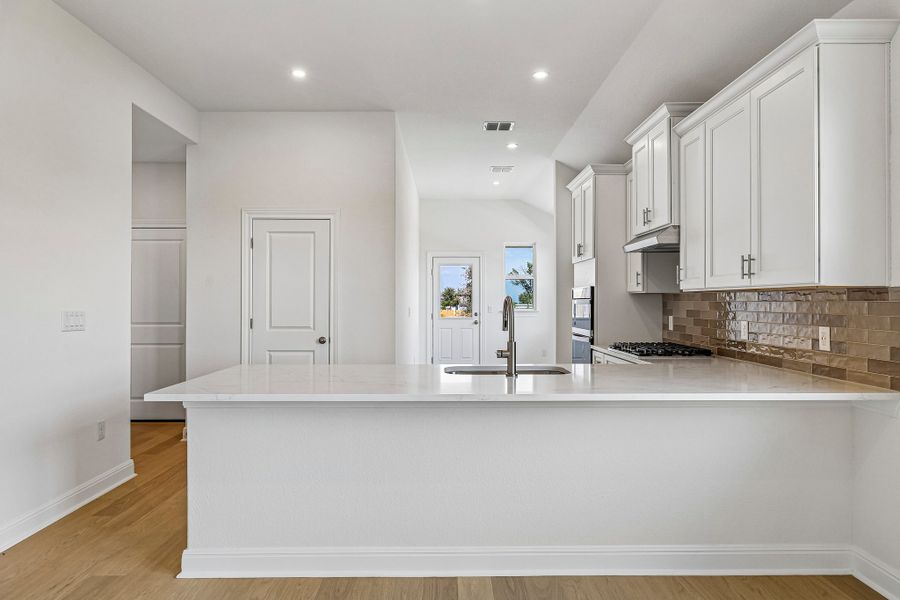 Furnished interior view inside a new home in Sage Hollow, Kyle (Image 5).