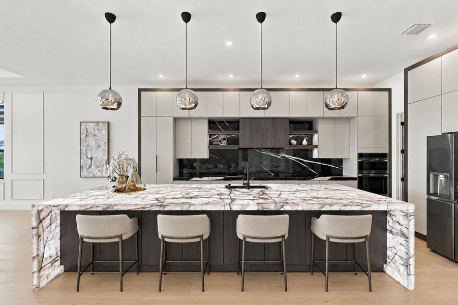 Designer Kitchen with Waterfall Island Designer Kitchen with Waterfall Island
