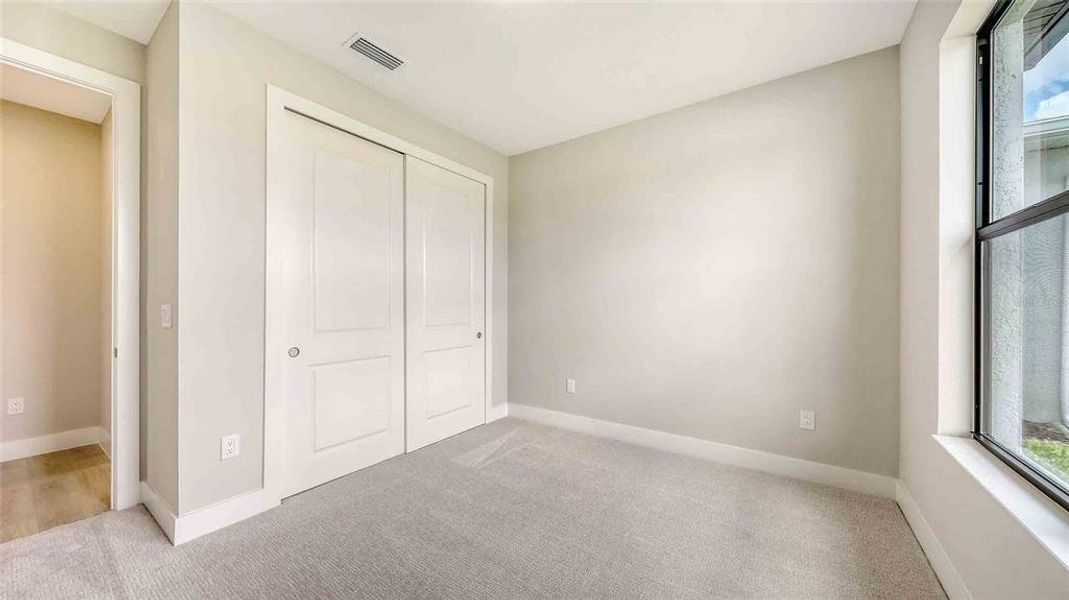 Spacious, unfurnished interior of a new home in Woodland Preserve, Parrish (Image 17).