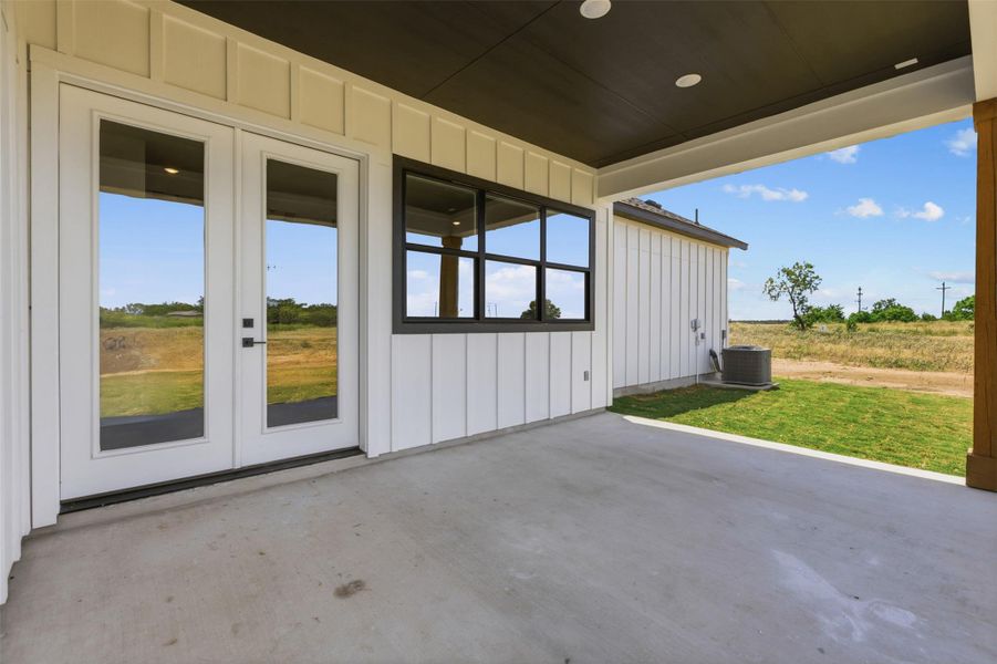 Exterior details and patio area of a home in , Dale (Image 4).
