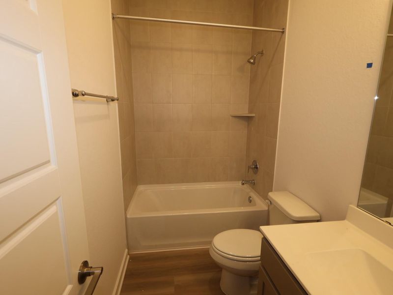 Furnished interior view inside a new home in Pinewood at Grand Texas, New Caney (Image 8).