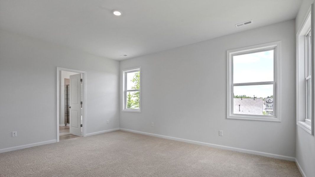 Representative unfurnished interior of a home built from the Lucas by D.R. Horton in The Manors at Haywood Glen, Knightdale (Image 26).