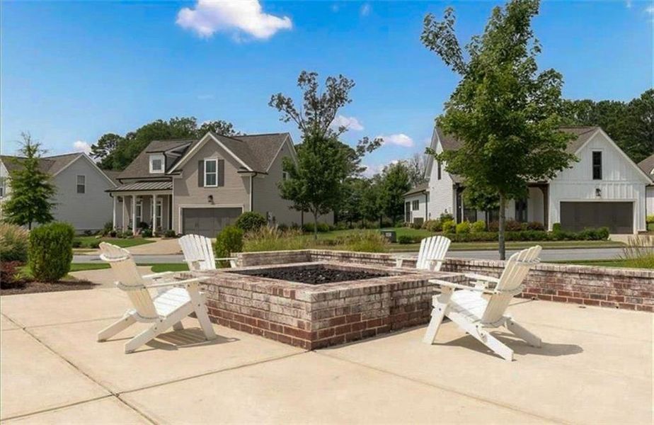 Front exterior of a new home in Idylwilde, Canton, GA, highlighting curb appeal (Image 1).