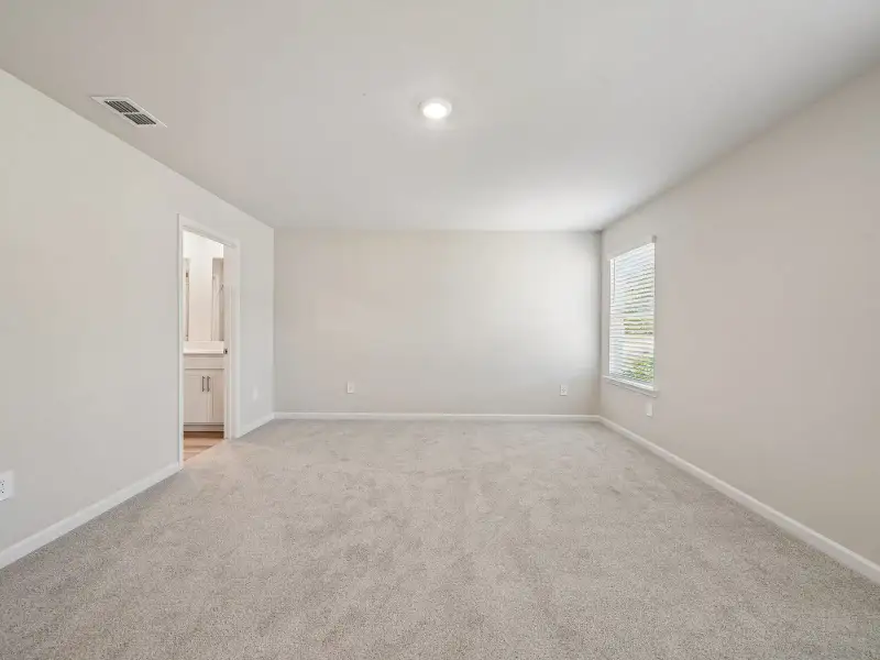 Spacious, unfurnished interior of a new home in Brooks Lake, Loganville (Image 10).
