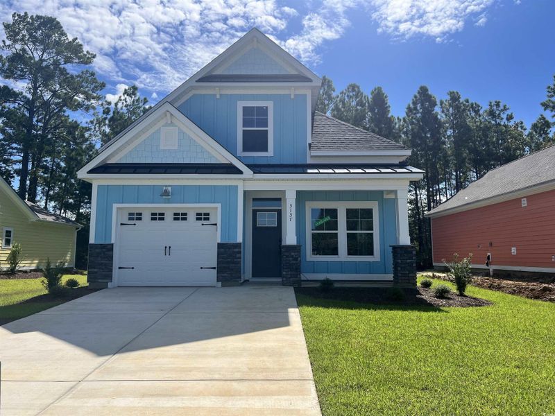 Front exterior of a new home in White Oak Estates, Conway, SC, highlighting curb appeal (Image 4). Front exterior of a new home in White Oak Estates, Conway, SC, highlighting curb appeal (Image 4).