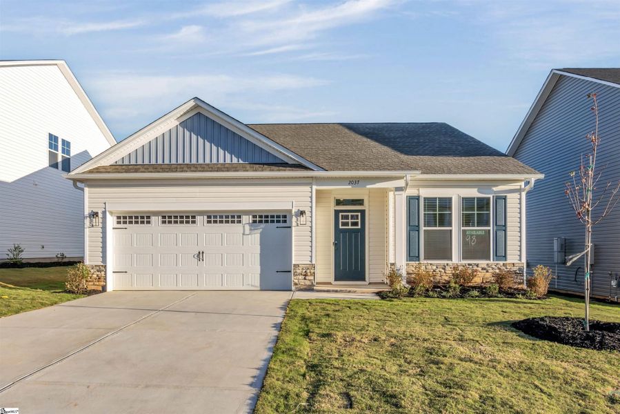 Front exterior of a new home in Halton Oaks, Spartanburg, SC, highlighting curb appeal (Image 2).