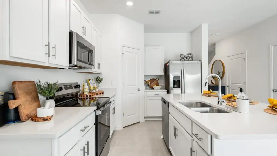 Furnished interior view inside a new home in Skye Ranch Community Group Page, Sarasota (Image 12).
