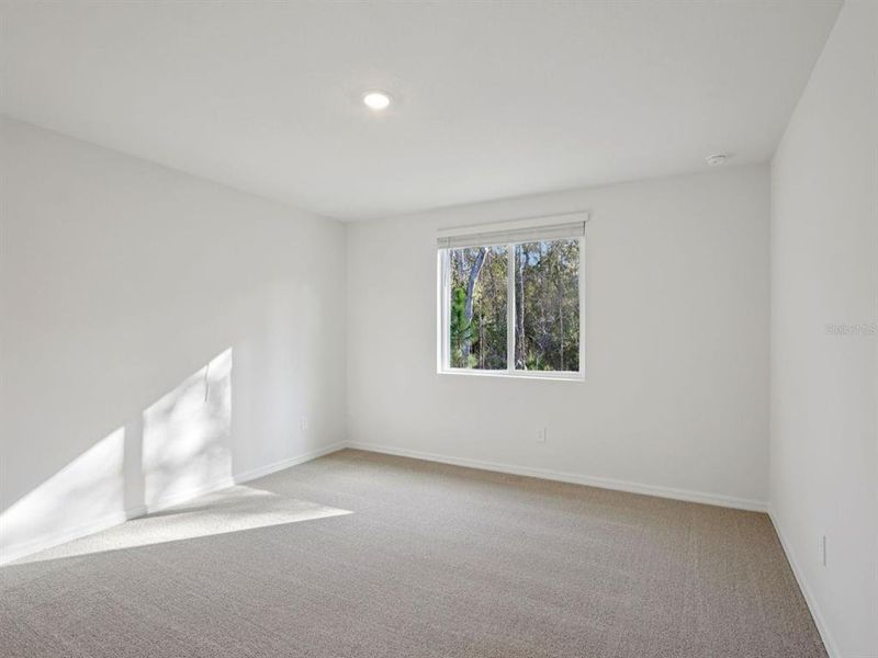 Spacious, unfurnished interior of a new home in Oakfield Trails - Premier Series, Parrish (Image 13).