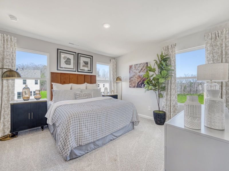 Primary bedroom in the Amber floorplan at a Meritage Homes community in Graham, NC.