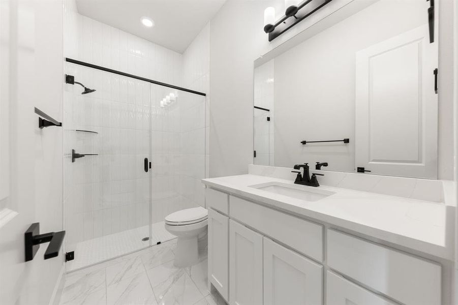 Friends and family will feel right at home in any of the beautifully finished guest baths our Laithan plan offers.