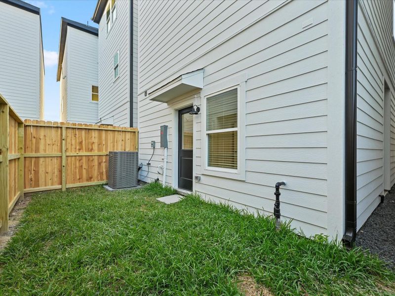 Exterior details and patio area of a home in Skyline Homes at Cavalcade, Houston (Image 3).