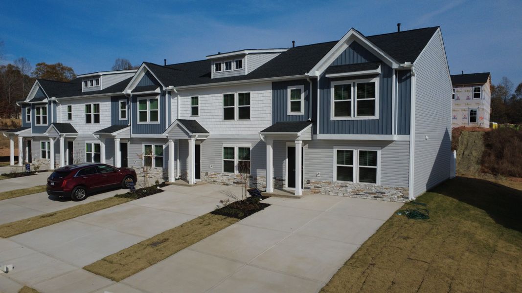 Front exterior of a new home in Meece, Easley, SC, highlighting curb appeal (Image 2).