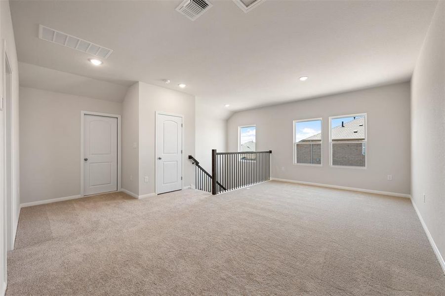 Spacious, unfurnished interior of a new home in The Colony, Bastrop (Image 24). Spacious, unfurnished interior of a new home in The Colony, Bastrop (Image 24).