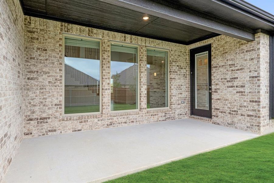 Exterior details and patio area of a home in Wildflower Ranch 60-65, Fort Worth (Image 3). Exterior details and patio area of a home in Wildflower Ranch 60-65, Fort Worth (Image 3).