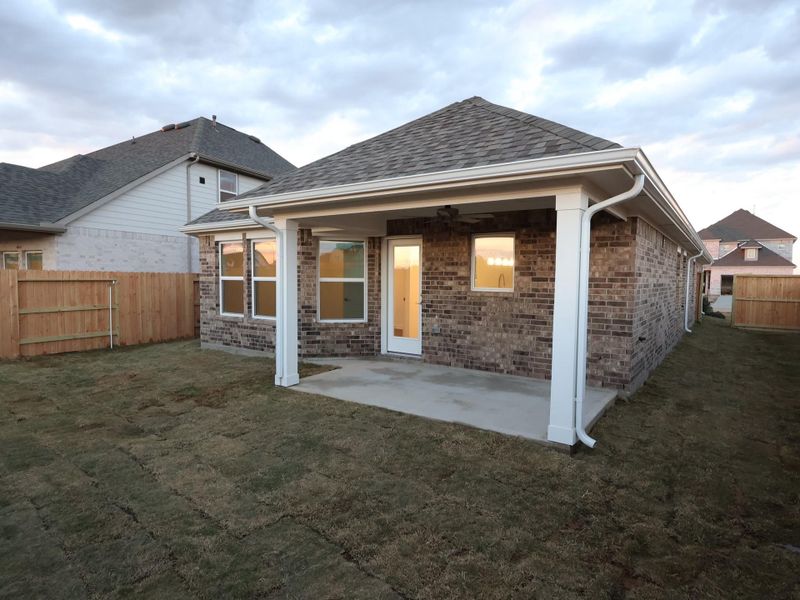 Exterior details and patio area of a home in Wildrye, Waller (Image 3).