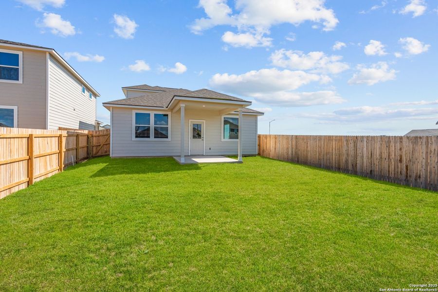 Front exterior of a new home in Talley Fields, San Antonio, TX, highlighting curb appeal (Image 1). Front exterior of a new home in Talley Fields, San Antonio, TX, highlighting curb appeal (Image 1).