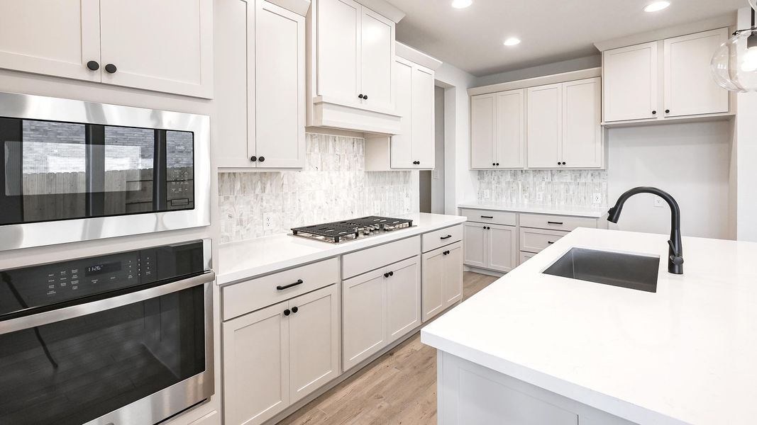 Furnished interior view inside a new home in Crosswinds 50', Kyle (Image 10).